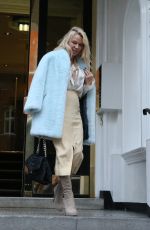 PAMELA ANDERSON Leaves Ecuadorian Embassy in London 12/05/2017