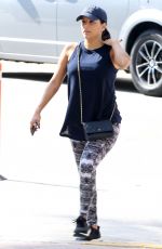 Pregnant EVA LONGORIA and Hose Baston Out in Miami 12/25/2017