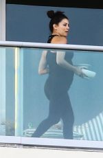Pregnant EVA LONGORIA at Her Hotel Balcony in Miami 12/225/2017