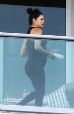 Pregnant EVA LONGORIA at Her Hotel Balcony in Miami 12/225/2017