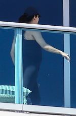 Pregnant EVA LONGORIA at Her Hotel Balcony in Miami 12/225/2017