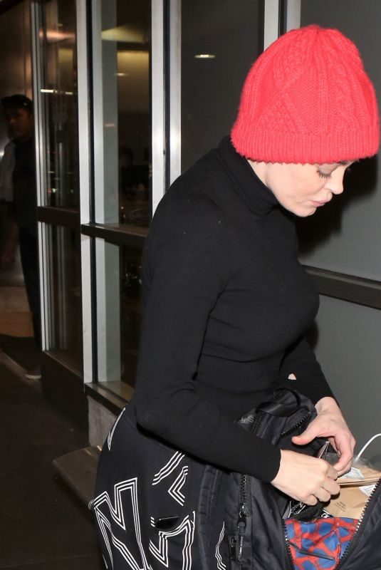 ROSE MCGOWAN at LAX Airport 12/26/2017