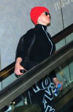 ROSE MCGOWAN at LAX Airport 12/26/2017