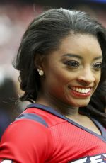 SIMONE BILES Performs with Houston Texans Cheerleaders at NRG Stadium in Houston 12/10/2017