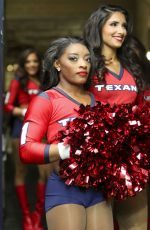 SIMONE BILES Performs with Houston Texans Cheerleaders at NRG Stadium in Houston 12/10/2017