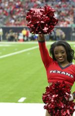 SIMONE BILES Performs with Houston Texans Cheerleaders at NRG Stadium in Houston 12/10/2017