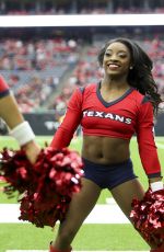 SIMONE BILES Performs with Houston Texans Cheerleaders at NRG Stadium in Houston 12/10/2017