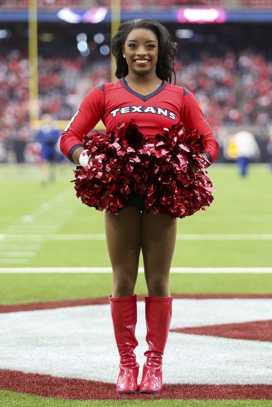 SIMONE BILES Performs with Houston Texans Cheerleaders at NRG Stadium in Houston 12/10/2017