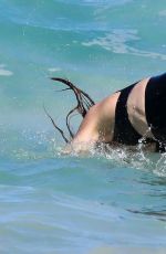 STELLA MCCARTNEY in Swimsuit at a Beach in St. Barts 12/29/2017