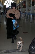VANESSA HUDGENS and Austin Butler at Los Angeles International Airport 12/16/2017