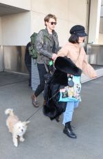 VANESSA HUDGENS and Austin Butler at Los Angeles International Airport 12/16/2017