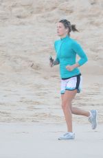 ALI LARTER Jogging on the Beach in Mexico 12/31/2017