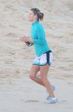 ALI LARTER Jogging on the Beach in Mexico 12/31/2017