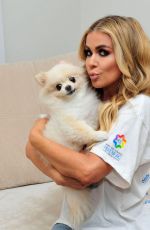 CARMEN ELECTRA with Her Dog on the Set of a Photoshoot 01/29/2018