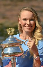 CAROLINE WOZIACKI Poses with Her Australian Open Trophy at Botanical Gardens in Melbourne 01/28/2018