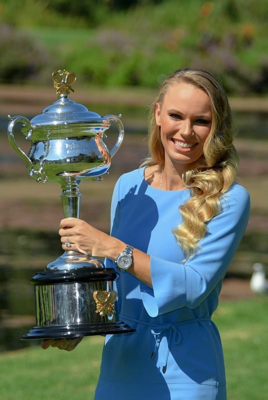 CAROLINE WOZIACKI Poses with Her Australian Open Trophy at Botanical Gardens in Melbourne 01/28/2018