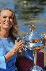 CAROLINE WOZIACKI Poses with Her Australian Open Trophy at Botanical Gardens in Melbourne 01/28/2018