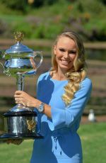 CAROLINE WOZIACKI Poses with Her Australian Open Trophy at Botanical Gardens in Melbourne 01/28/2018