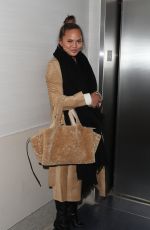 CHRISSY TEIGEN at LAX Airport in Los Angeles 01/18/2018
