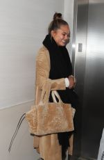 CHRISSY TEIGEN at LAX Airport in Los Angeles 01/18/2018