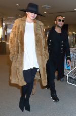 CHRISSY TEIGEN at Narita International Airport in Tokyo 01/01/2018