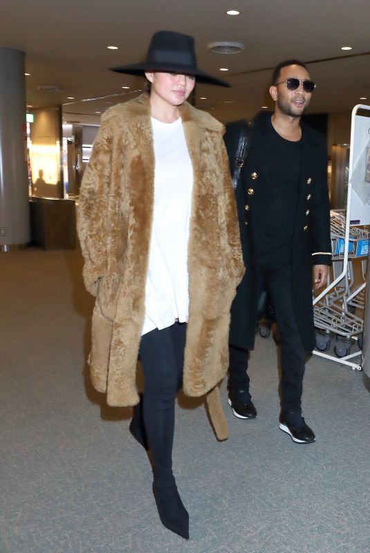 CHRISSY TEIGEN at Narita International Airport in Tokyo 01/01/2018