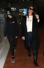 CINDY CRAWFORD and KAIA GERBER at Charles De Gaulle Airport in Paris 01/19/2018