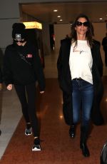 CINDY CRAWFORD and KAIA GERBER at Charles De Gaulle Airport in Paris 01/19/2018
