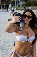 CLAUDIA ROMANI in White Bikini at a Beach in Miami 01/21/2018