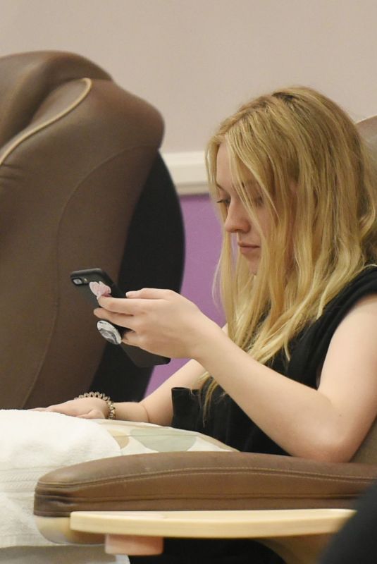 DAKOTA FANNING at a Salon in Los Angeles 01/04/2018