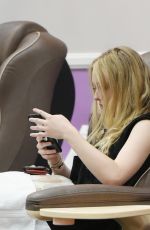 DAKOTA FANNING at a Salon in Los Angeles 01/04/2018