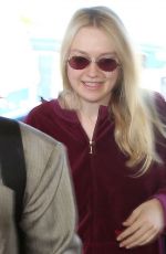 DAKOTA FANNING at LAX Airport in Los Angeles 01/22/2018
