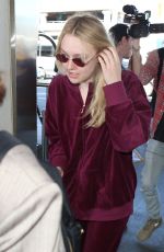 DAKOTA FANNING at LAX Airport in Los Angeles 01/22/2018