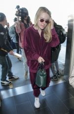 DAKOTA FANNING at LAX Airport in Los Angeles 01/22/2018