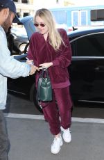 DAKOTA FANNING at LAX Airport in Los Angeles 01/22/2018