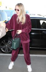 DAKOTA FANNING at LAX Airport in Los Angeles 01/22/2018