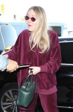 DAKOTA FANNING at LAX Airport in Los Angeles 01/22/2018