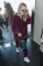 DAKOTA FANNING at LAX Airport in Los Angeles 01/22/2018