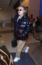 DAKOTA FANNING at Los Angeles International Airport 01/20/2018