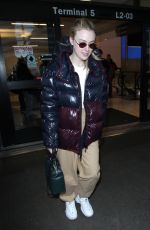 DAKOTA FANNING at Los Angeles International Airport 01/20/2018