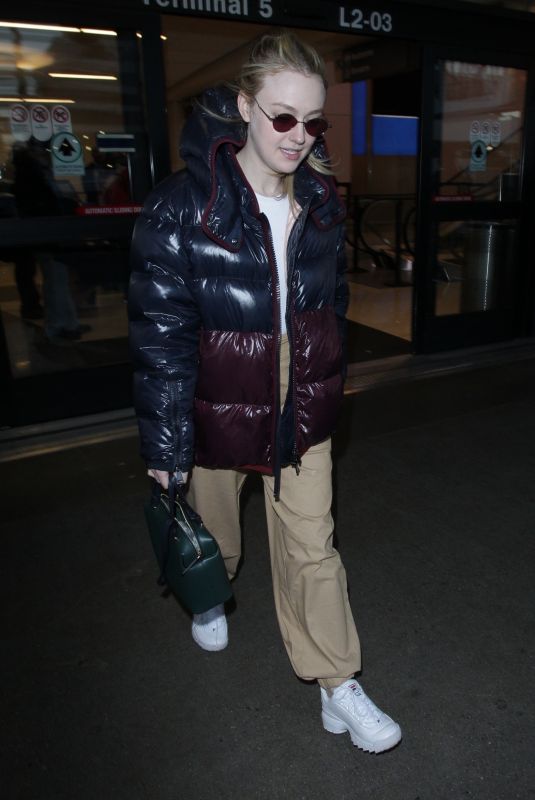 DAKOTA FANNING at Los Angeles International Airport 01/20/2018