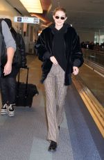 GIGI HADID at Haneda International Airport in Tokyo 01/26/2018
