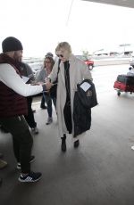 GRETA GERWIG at LAX Airport in Los Angeles 01/08/2018