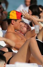 HAILEY BALDWIN in Bikini on the Beach in Miami 01/01/2018