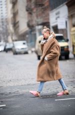 HAILEY BALDWIN in Oversized Coat and Slippers Out in New York 01/16/2018