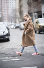 HAILEY BALDWIN in Oversized Coat and Slippers Out in New York 01/16/2018