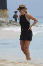 HOLLY WILLOUGHBY in Swimsuit at a Beach in Caribbean 12/31/2017