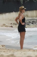 HOLLY WILLOUGHBY in Swimsuit at a Beach in Caribbean 12/31/2017