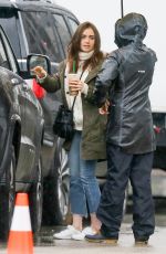 LILY COLLINS Arrives on the Set of Extremely Wicked, Shockingly Evil and Vile in Cincinnati 01/29/2018