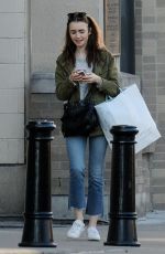 LILY COLLINS Out and About in Cincinnati 01/29/2018
